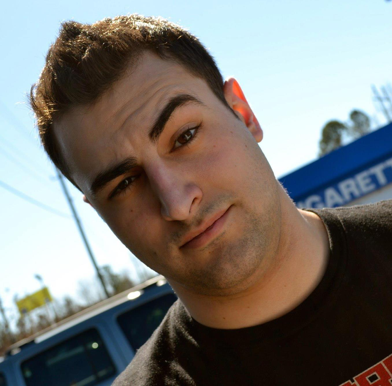 Picture of Ian with one eye brow raised in a cheeky fashion